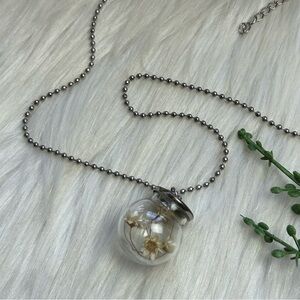 White dried flower globe silver tone necklace